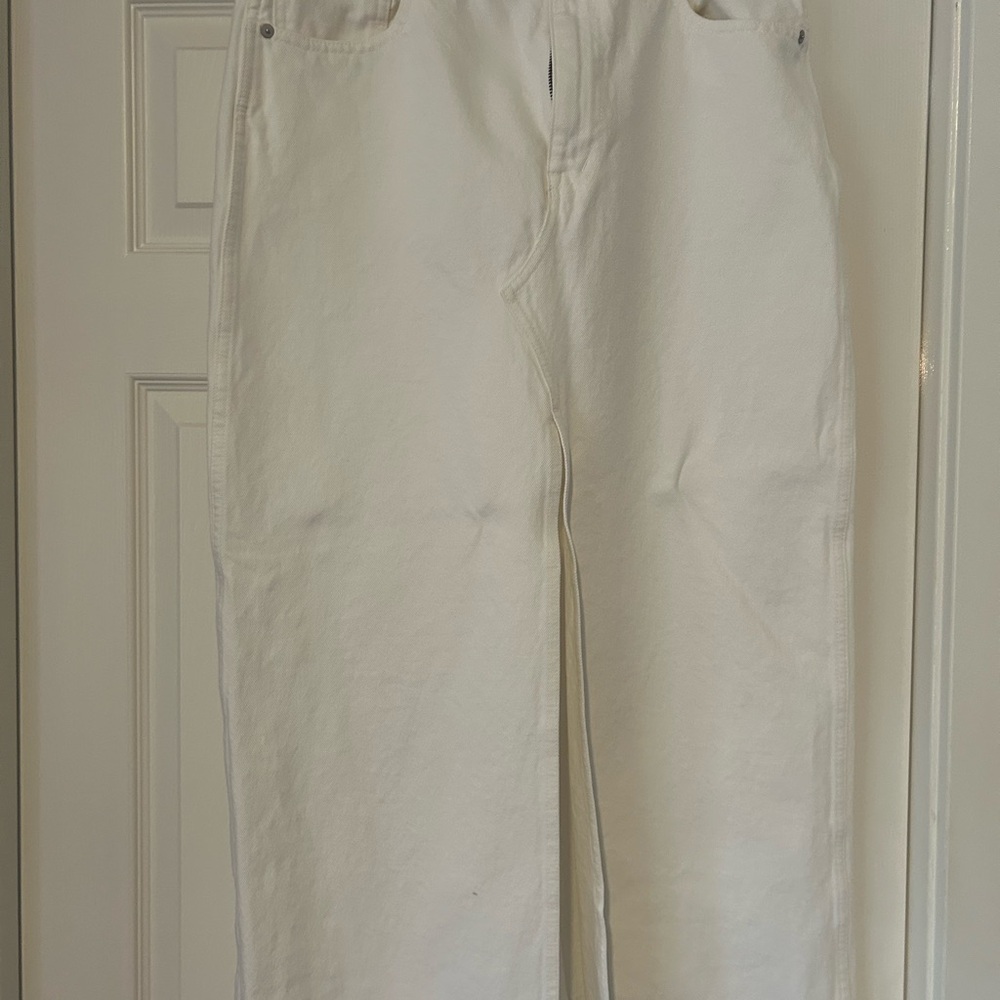 Women's White Denim Skirt with frayed him. Very stylish and versatile.